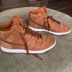 Women’s brown Nike high top dunks