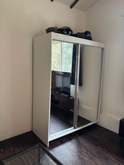 Full double mirror closet.