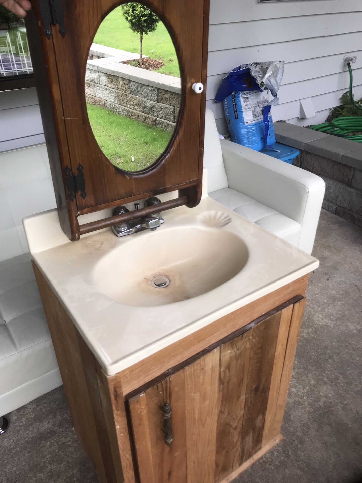 Ceramic bathroom cabinet and medicine cabinet with mirror.