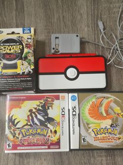 Pokeball 2DS LX bundle with heartgold and omega ruby