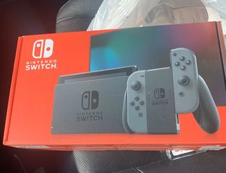 Nintendo switch grey 32 GB in hand for sale now