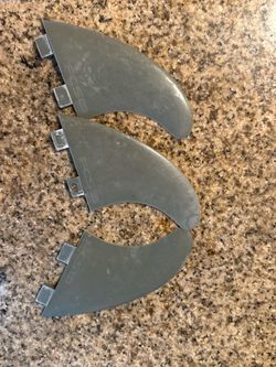 Surfboard fins