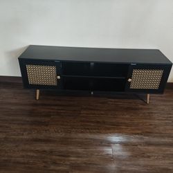 GOLD AND BLACK RATTAN TV STAND