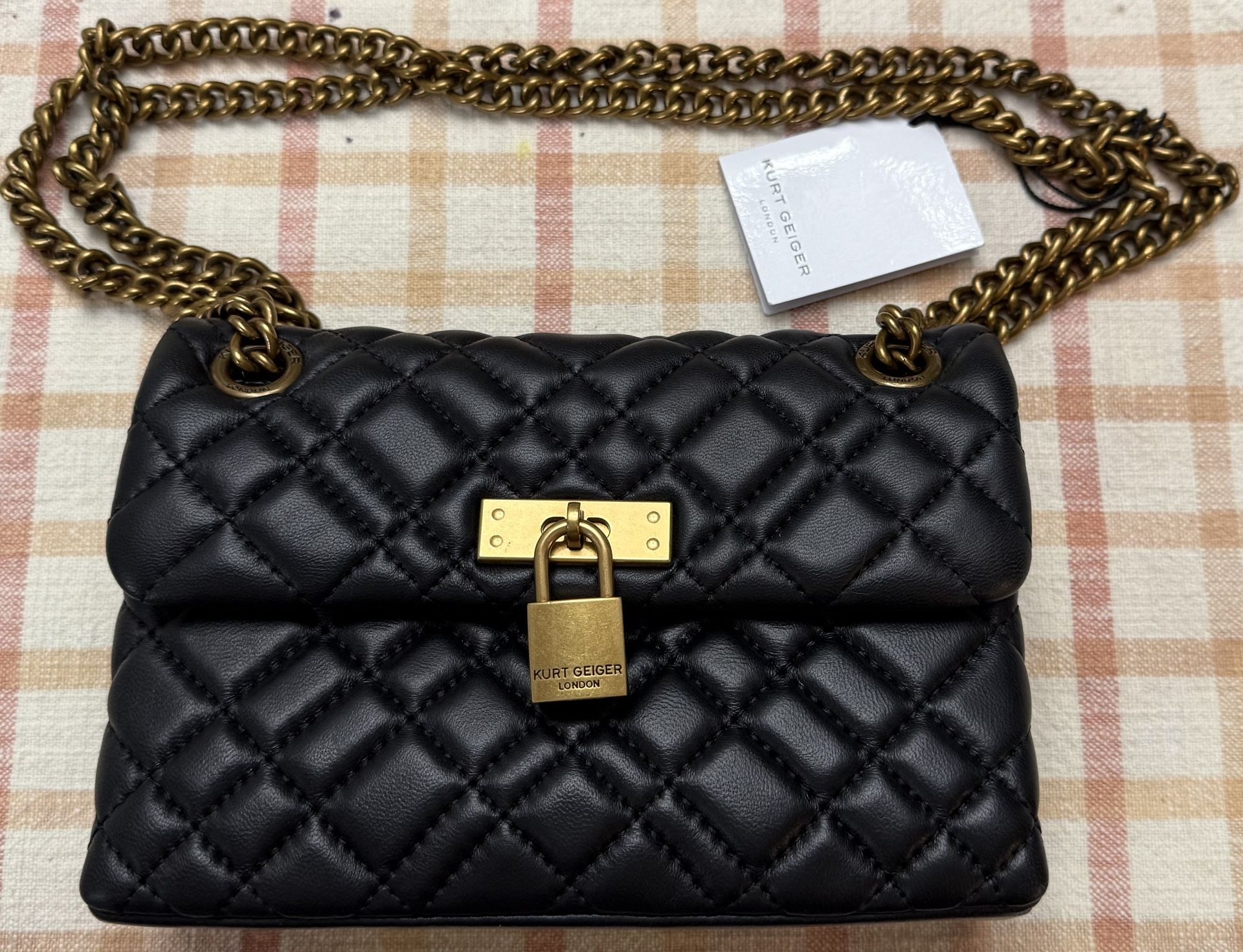 Kurt Geiger Brixton black mini leather bag.