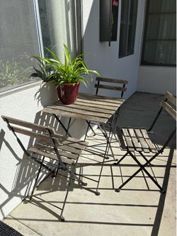 Ikea table with 4 matching chairs