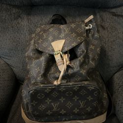 Louis Vuitton Monogram Montsouris GM backpack in brown monogram canvas with vachetta leather trim