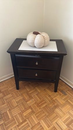 Two nightstands and a hutch
