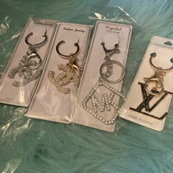 Mk Lv Chanel Key Chains Ear Rings $10  Gucci Insp Slides Size 40/8 $80  Picture Frames $30  Pick up ASAP  