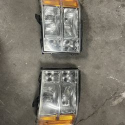 GMC Sierra OEM headlights