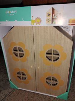House-shaped wall shelf
Features doors with floral cutouts! Brand New!