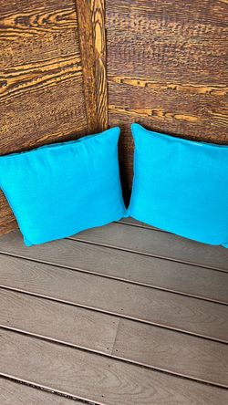 Two turquoise pillows