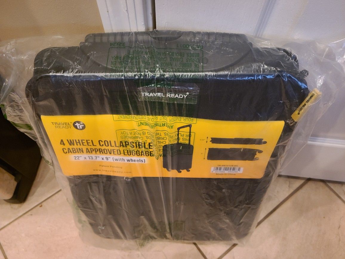 Carry On Suit Case, New $22