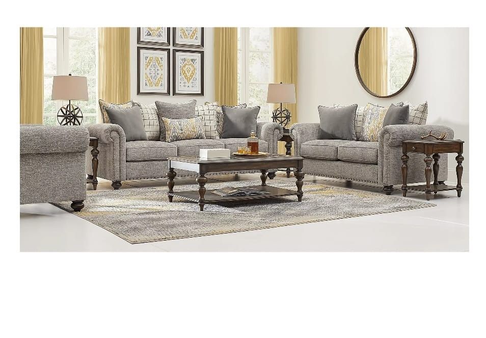 BRAND NEW COUCHES. STILL IN PLASTIC WRAP