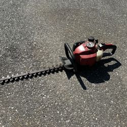 Redmax CHTZ2400L hedge trimmer, in working condition.