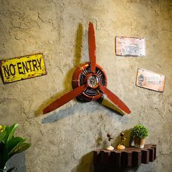 Vintage propeller decorating wall mounted clocks Thumbnail