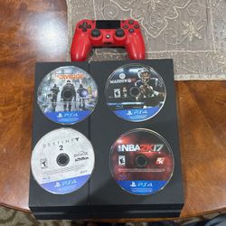 Ps4 with 4 disks and a controller