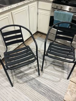 Two new very well made black rubber patio chairs
