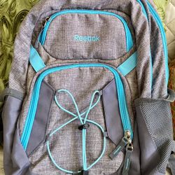 Reebok Gray & Turquoise Backpack w/ multiple zippered pockets 