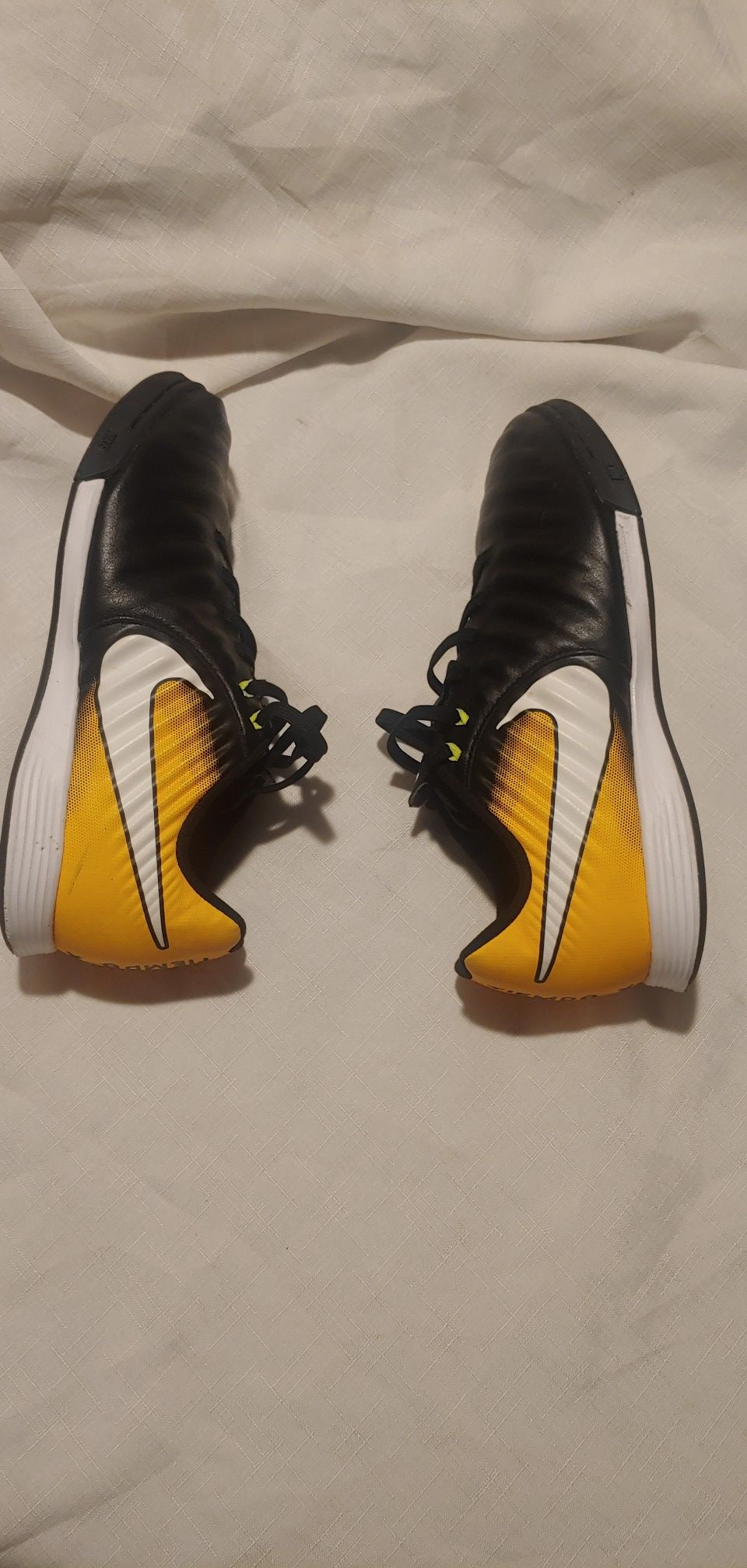 Boys tiempo x black and yellow nike Soccer cleats size 5.5
