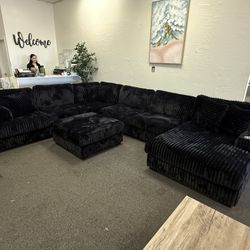 Giant Black Corduroy Sectional With Ottoman 