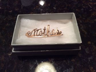 Gold tone Mother pin