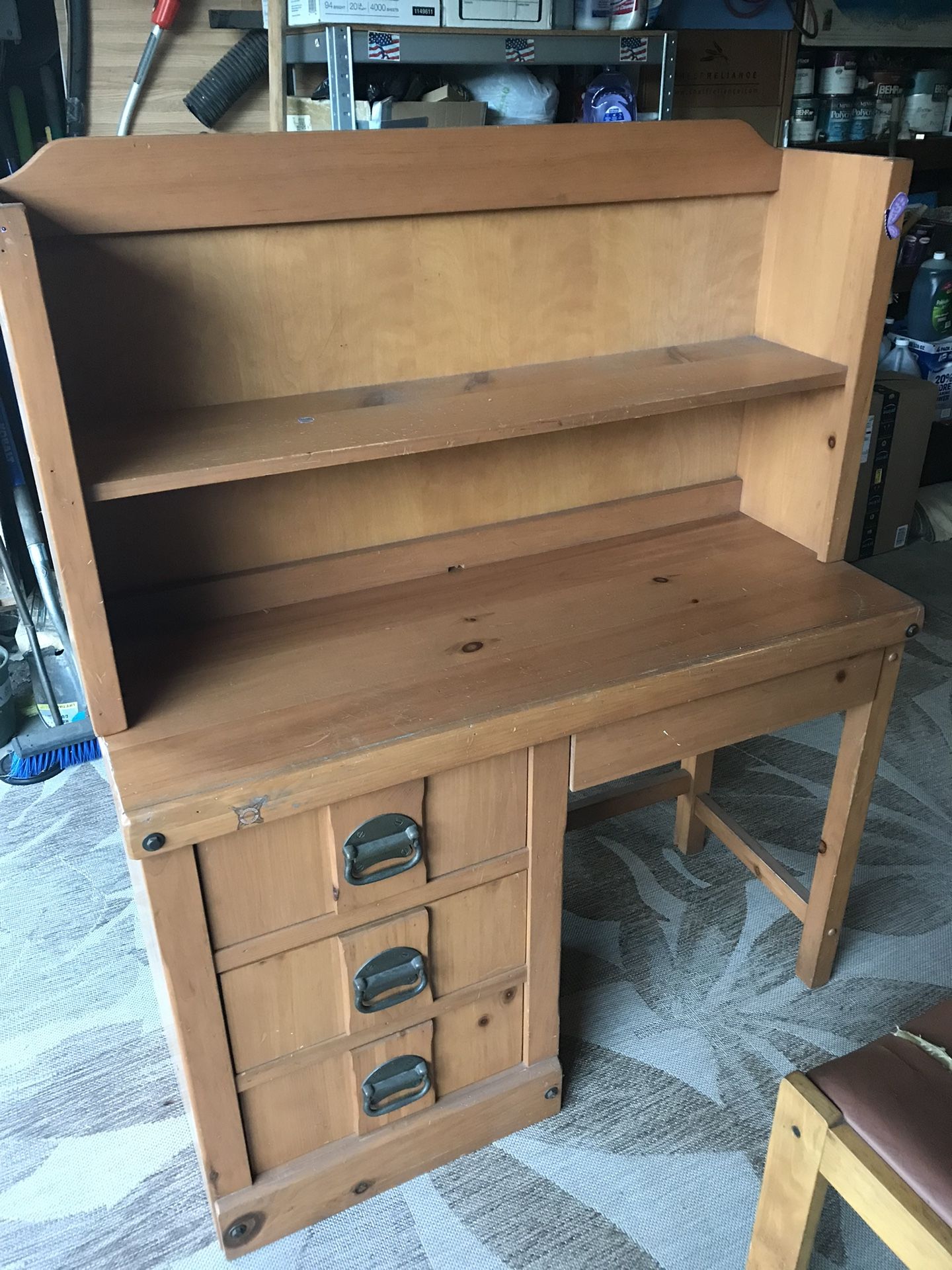 Wooden desk with bookshelf and chair