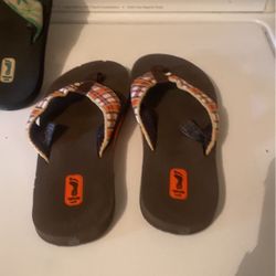 Tevas On Left Size 9 Ones On Right Size 8 