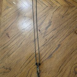Rope Necklace with 2 Beads and a Carved Tribal Pendant