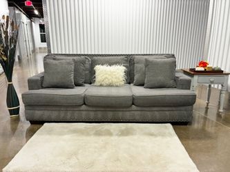 Ashley Furniture Signature By Design Sofa With Accent Nailhead Trim Including Delivery and Matching Pillows