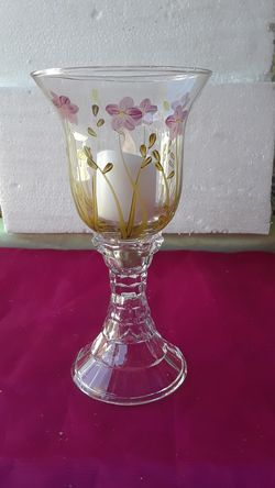 Hermoso candelabro es home interiors , no incluye la vela.