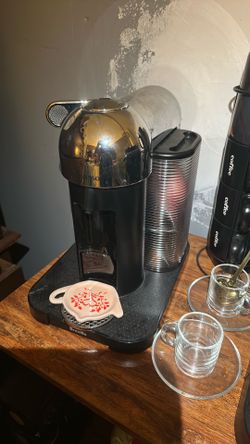 Nespresso vertuo machine and Nespresso delonghi with frother