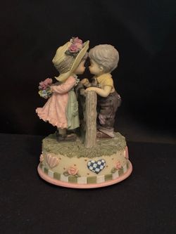 Vintage Musical- Boy and Girl kissing at the fence
