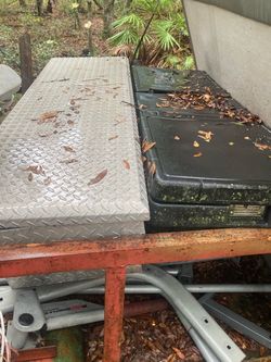 Truck tool boxes plastic and an aluminum one