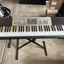 Casio 61-Key Lighted Portable Keyboard W/ EFX Sound Sampler (LK-175) & Cord, Stand, Casio Song Book