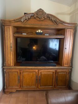 Large Wood Entertainment Center with Carved Detail
