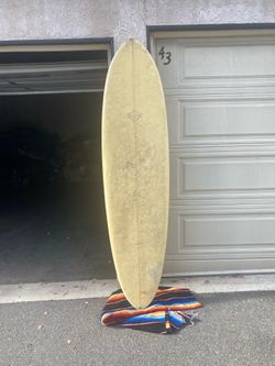 7’2” mid length egg surfboard
