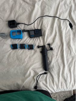 GoPro HERO10 Black — Complete Bundle | Volta Grip, 3 Enduro Batteries, Dual Charger & More