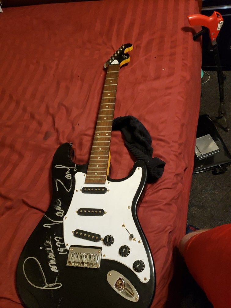 Ronnie Van Zant Signed Guitar From 1977.