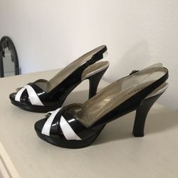 Black and white strap heel