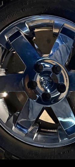 ONE.     WHEEL WITH TIRE ONLY FOR RAM 1500 5 LUGS 