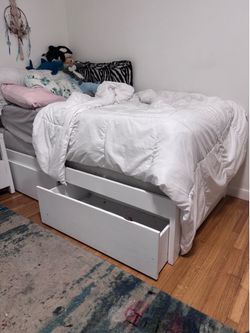 Free Kids Twin Bed and mattress and table and bedside tables and a rug