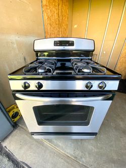 GE gas stove 4 burners stainless st.  30”