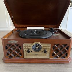Vinyl Record Player w/ tape deck, radio and CD player 