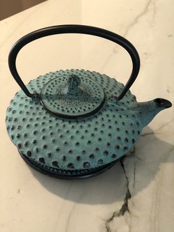 Japanese cast iron tea kettle with stand