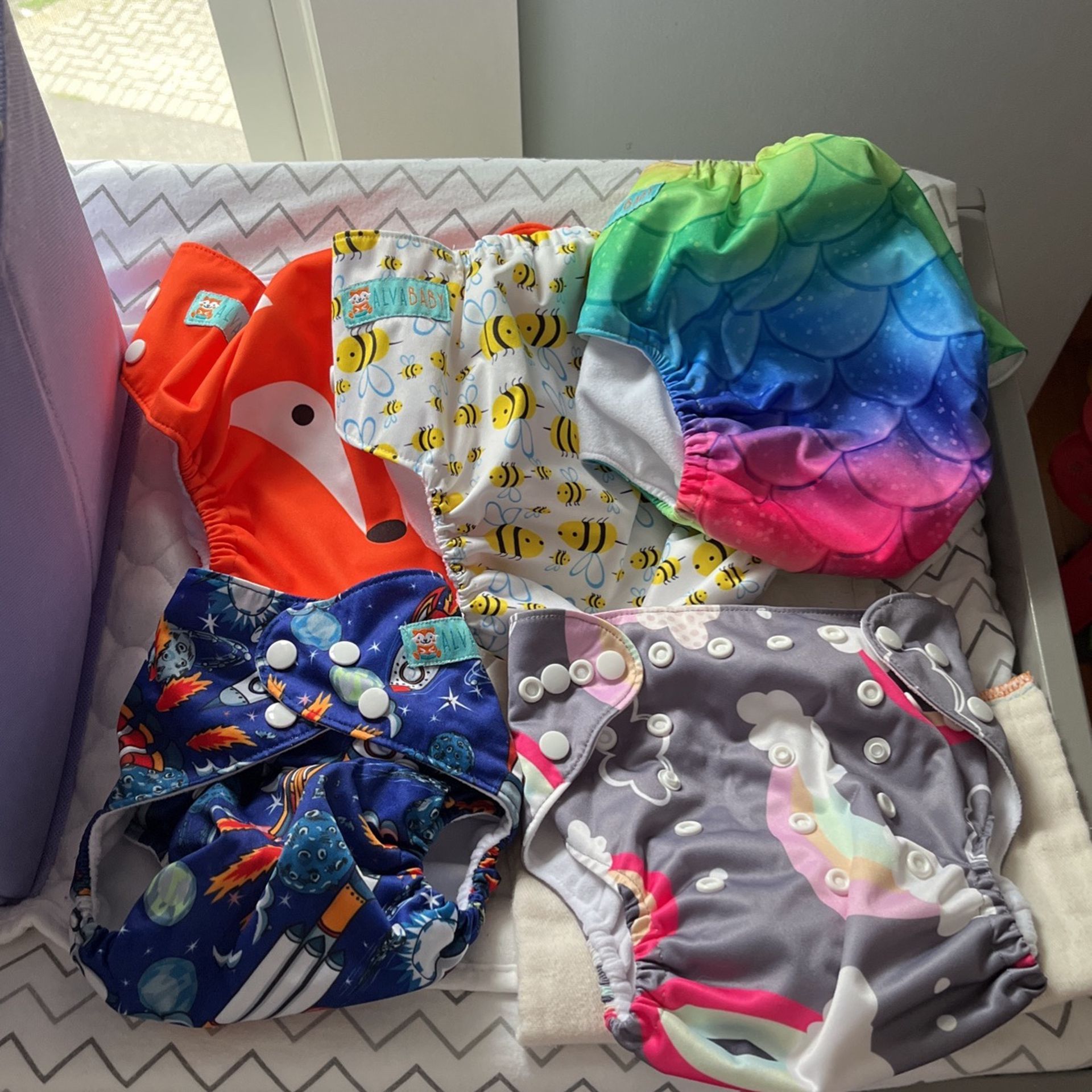 Multiple Types, Brands, And Sizes Of Cloth Diapers