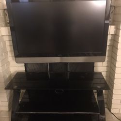 42 inch Vizio TV with table and remote 