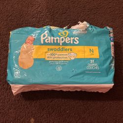 16 newborn pamper diapers!!