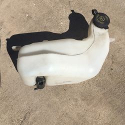 2004 mustang windshield washer fluid container.