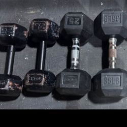 Assorted Dumbbells - Three 25’s, One 30. 