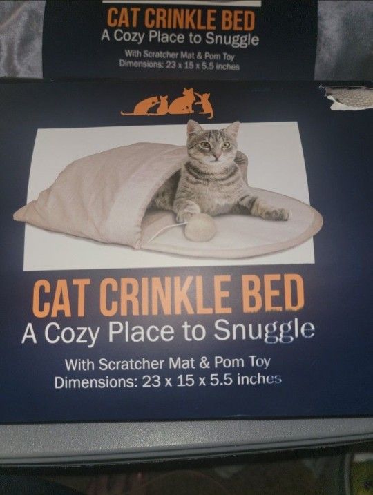 NEW CAT CRINKLE BED. COZY SNUGGLE WITH SCRATCH PAD AND POM POM TOY